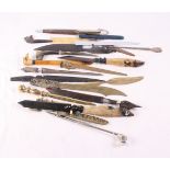 Six brass letter openers, various, two horn and hoof letter openers and a number of others