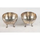 A pair of silver quatrefoil bowls with reeded rims and hoof feet, 11.1oz troy approx