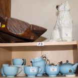 A Wedgwood powder blue and gilt decorated part teaset and a Staffordshire model of a seated spaniel