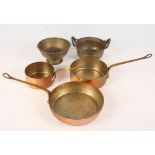 Two 19th Century Malacca brass bowls and three copper saucepans, in sizes