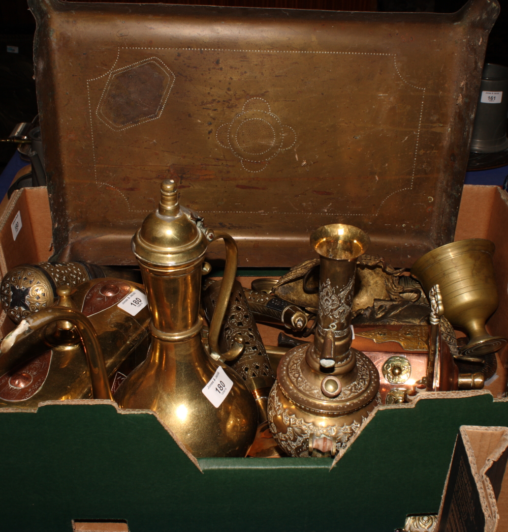 A collection of Middle Eastern copper and brass items