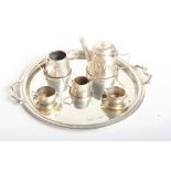 A doll's silver morning tea set with circular tray, 3 1/2" dia, 1.36oz troy approx, and an early