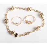 Two 9ct gold rings and a 9ct gold bracelet, 11.6g