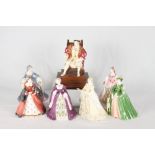 A set of Wedgwood limited edition china figures of Henry VIII and his six wives