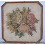 A 19th Century floral needlepoint panel, 12 1/2" x 12 1/2", in octagonal frame