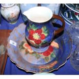 A Royal Doulton floral decorated jug and basin set, pattern number D6227, basin 12" dia