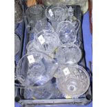 An assortment of cut glass vases and jugs, etc