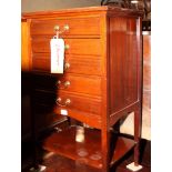 An early 20th Century sheet music cabinet, fitted five drawers and underplatform