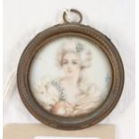 A circular miniature portrait of an unknown lady, 2 1/4" dia, indistinctly signed