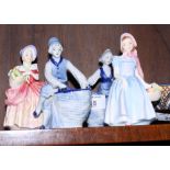 Two Royal Doulton figures, "Cissie" HN1809 and "Wendy" HN2109, and two continental porcelain Dutch