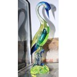 A Murano green and blue glass model of a stork, inscribed on base and dated 1964, 17" high