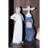 Two Lladro porcelain figures of a young girl stretching and a lady doing embroidery, 8" high