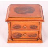A 19th Century Mauchline ware miniature chest of drawers, 5 3/4" wide