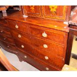 A 19th Century mahogany chest of two short and three long drawers fitted oval gilt metal handles, on