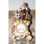 A late 19th Century French mantel clock in flower and gilt decorated porcelain case with surmount