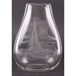 A glass vase engraved ladies and birds, 6" high, and a similar teardrop-shaped vase engraved sailing