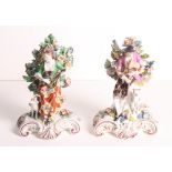 A pair of Samson "Derby" porcelain bocage figures of a lady playing a mandolin and a gentleman