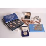 Four sets of Britain's first decimal coinage, a 1953 proof set, a 1977 proof set, a 1982 proof