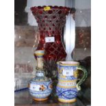 A ruby flashed crystal pedestal flower vase, 14" high, a Cantagalli bottle-shaped vase, 5" high, and