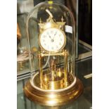 A brass 400-day clock under glass dome, 12" high