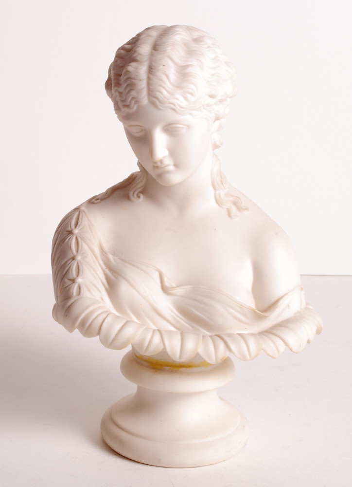 A 19th Century Parian bust of a lady, 9" high