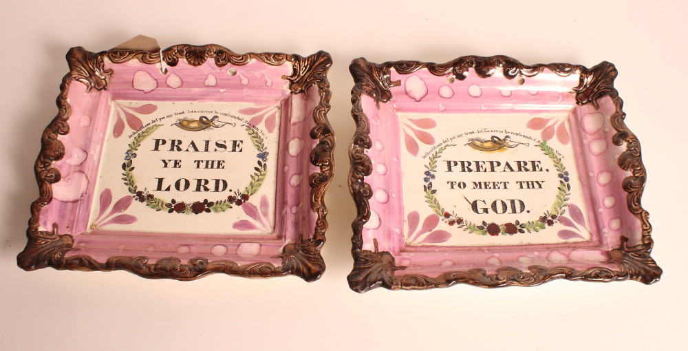 A pair of Sunderland ware pink lustre decorated rectangular wall plaques inscribed religious