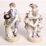 A pair of 19th Century Meissen porcelain figures of a lady with a sheep and a gentleman with a