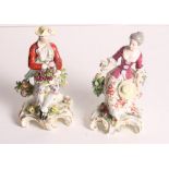 A pair of Samson "Derby" porcelain figures of a lady and gentleman holding flowers and grapes, on
