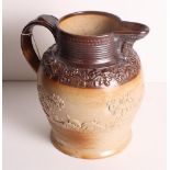 A 19th Century stoneware tavern jug, sides decorated sprigged hunting scenes, vines to shoulders,