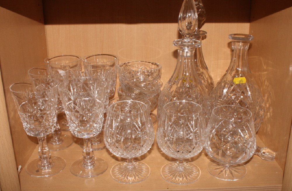 A set of six Royal Brierley cut glass wines, three cut glass decanters and a number of brandy