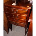 An early 20th Century sheet music cabinet, fitted four drawers, on square taper supports, 20" wide