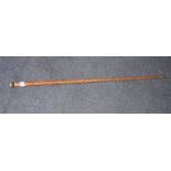 A palm wood walking stick with turned banded agate ball pommel