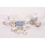 A collection of Wedgwood miniature bone china cabinet pieces and other miniature ornaments