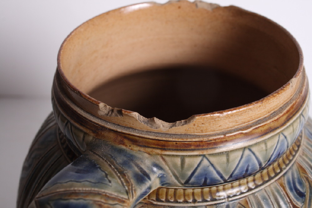 A Royal Doulton stoneware jug decorated in blue, brown and green glazes with panels of wrythen and - Image 4 of 4