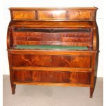 A mid 19th Century figured mahogany brass and ebony strung cylinder bureau, fitted three drawers