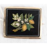 A 19th Century micro mosaic panel decorated fruit and flowers with yellow metal brooch mount (