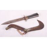 A 19th Century walnut handled double edge dagger, blade 7 3/4" long, and a folding knife with curved