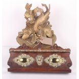 A Victorian brass mounted oak pipe rack, 13" wide, and a giltwood wall bracket carved birds