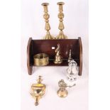 A pair of Victorian brass candlesticks, a brass door knocker, a trench art bottle stand, a