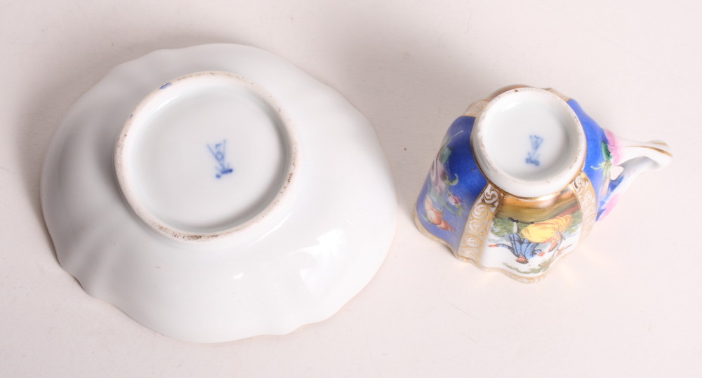 A Helena Wolfson figure decorated cabinet cup and saucer - Image 2 of 2