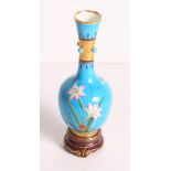 A 19th Century Minton bone china turquoise and floral glazed vase with gilt decoration in the manner