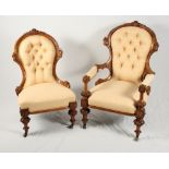 A late 19th Century French walnut framed open armchair, button upholstered in a gold damask, and a