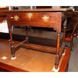 A 17th Century oak rectangular side table, fitted one drawer, on turned supports, 31" wide