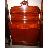 A 19th Century mahogany chiffonier, back fitted shelf, serpentine front base fitted two drawers