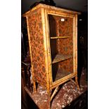 A Victorian bamboo framed pedestal display cabinet, fitted two shelves enclosed glazed door,