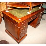 A 19th Century mahogany twin pedestal desk with green tooled leather top, fitted nine drawers, 48"