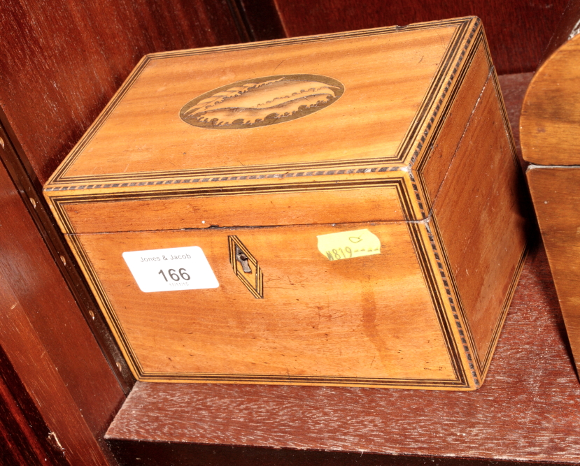 An 18th Century satinwood two-compartment tea caddy, lid inlaid marquetry shell, 6" wide