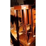 A George III mahogany octagonal kettle stand, fitted undertier, on square taper supports