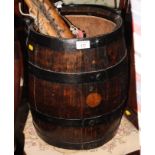 A wooden barrel fitted as a bucket with wrought iron bands, 15" high