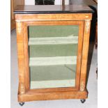 A Victorian figured walnut pier cabinet, fitted shelves enclosed glazed door, gilt metal mounts, 29"